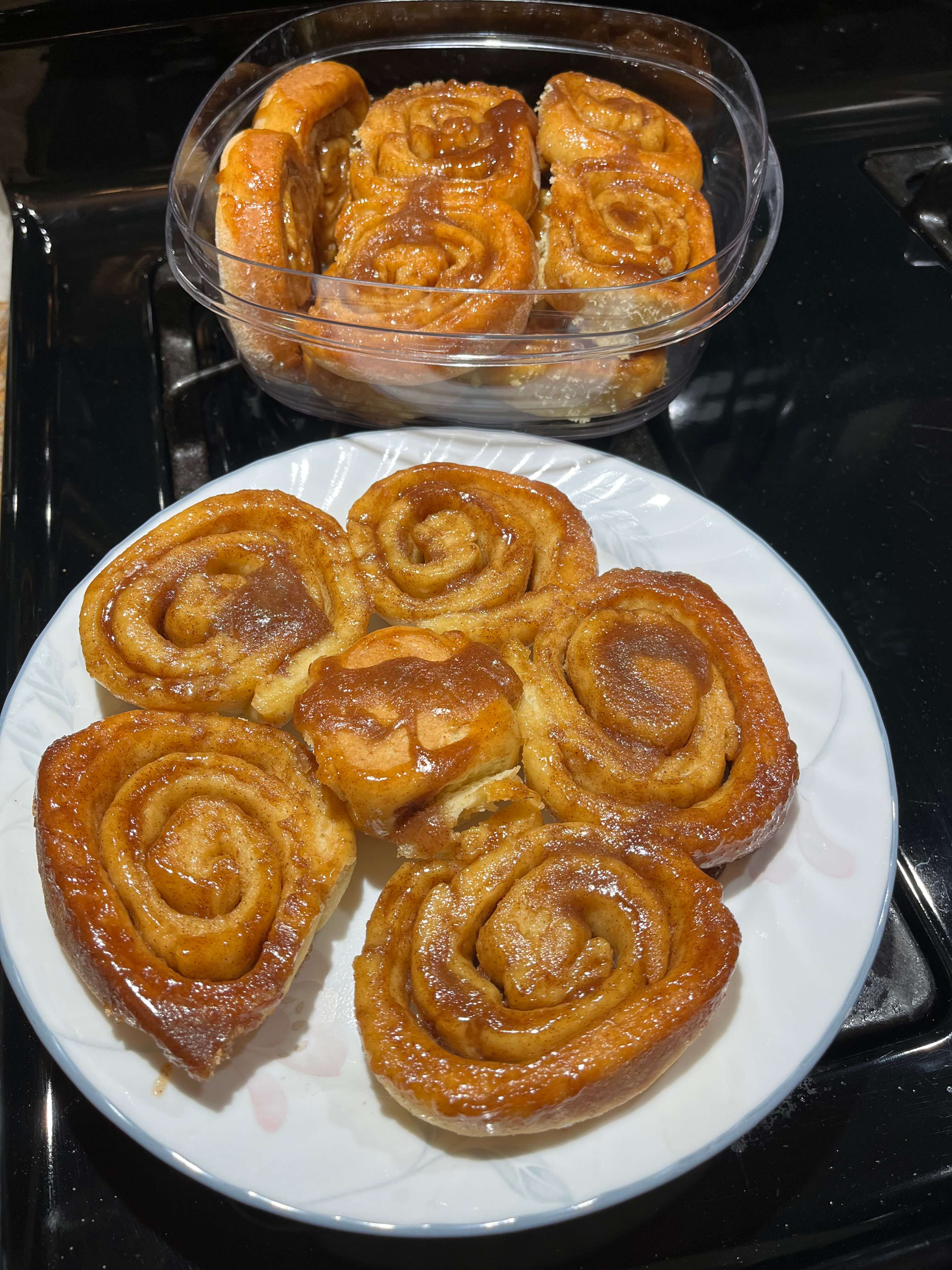 Collection of caramelized golden cinnamon rolls.