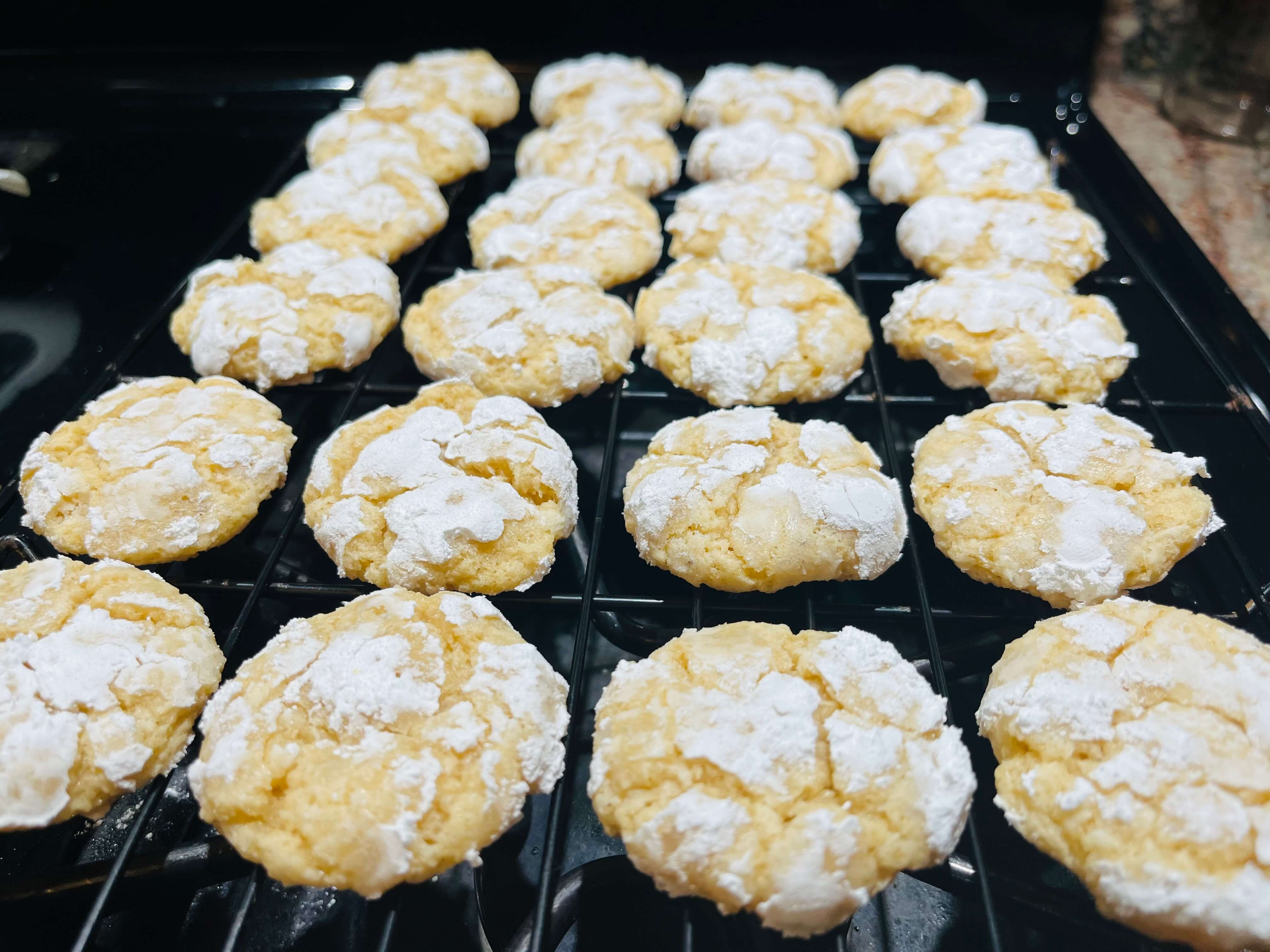 Lemon coconut crackle cookies dusted with powdered sugar